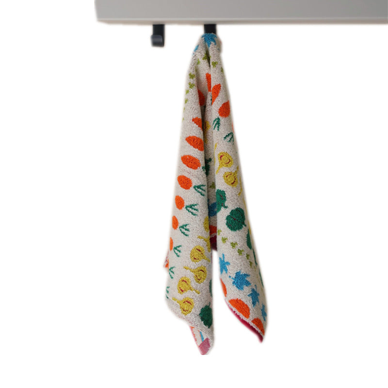 Highly absorbent terry kitchen towel with cheerful vegetable and flower design