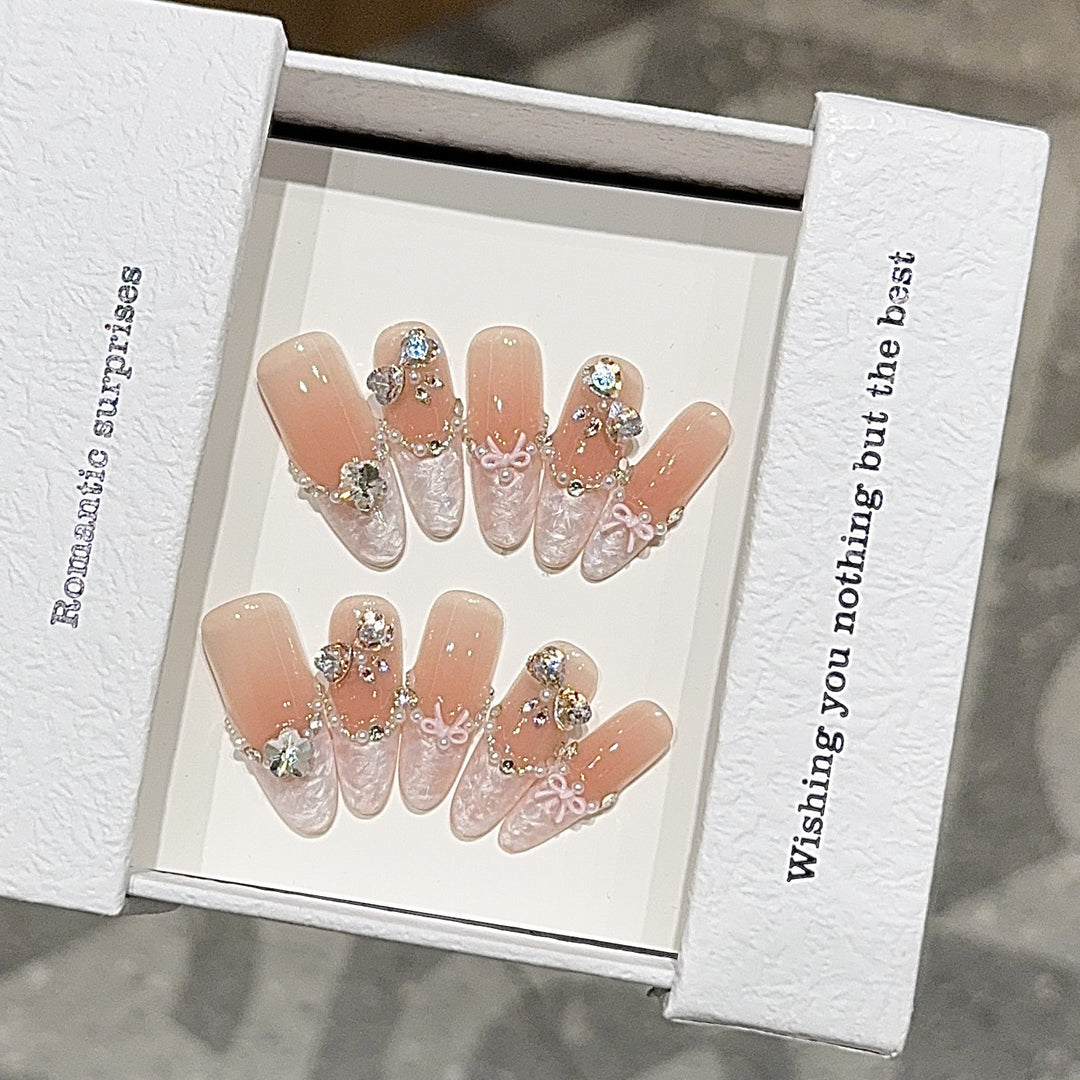 Artificial nails with romantic rhinestone details Kalsten