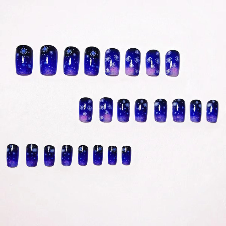 Artificial nails with shimmering winter design Kalsten