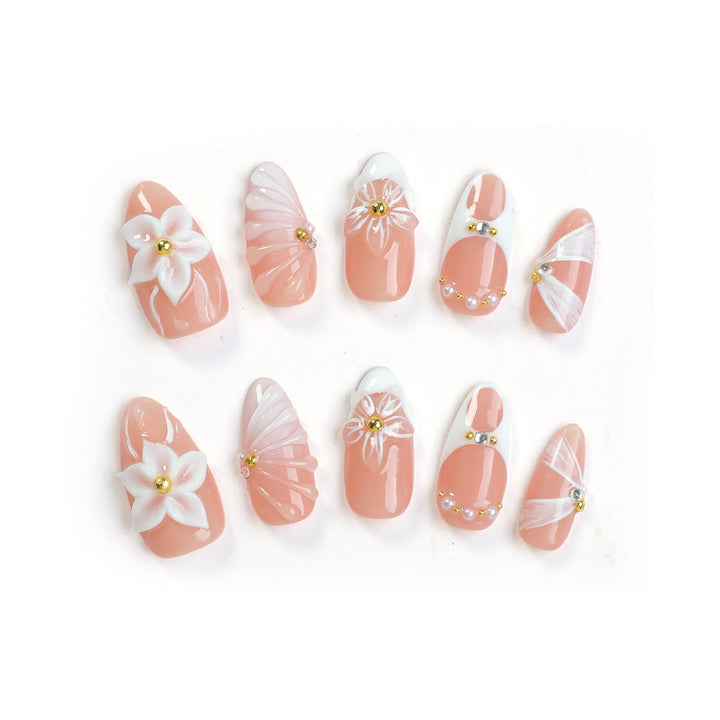 Nail art set with floral decorations and radiant accents Kalsten