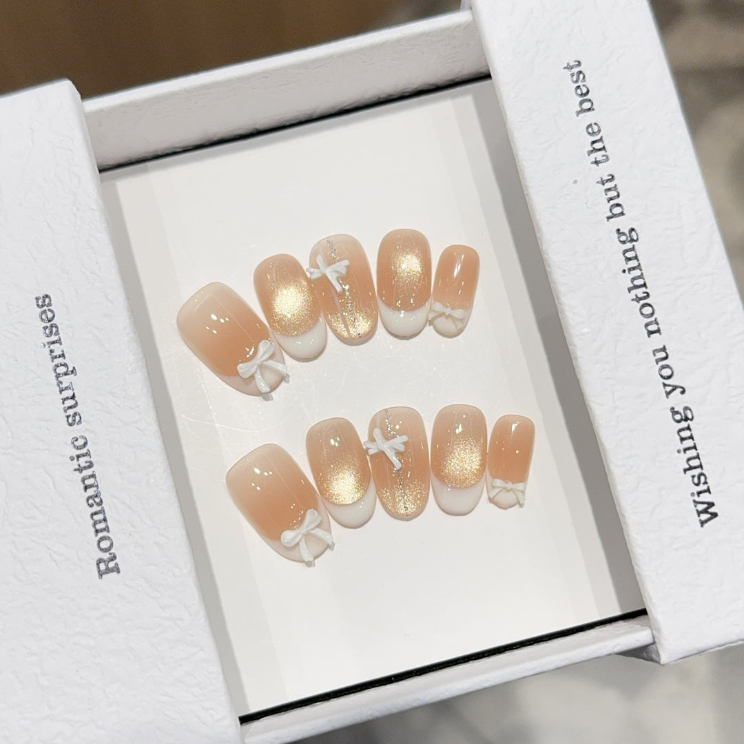 Artificial nails with romantic bow and glitter effects Kalsten