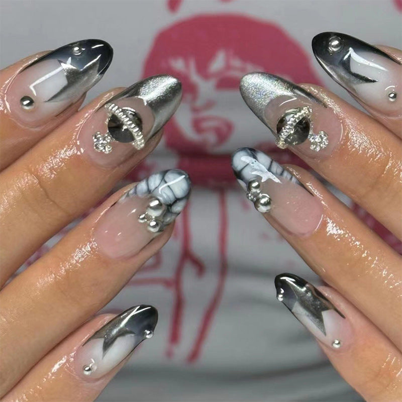 Artful acrylic nails with elegant 3D decorations and glitter effects Kalsten