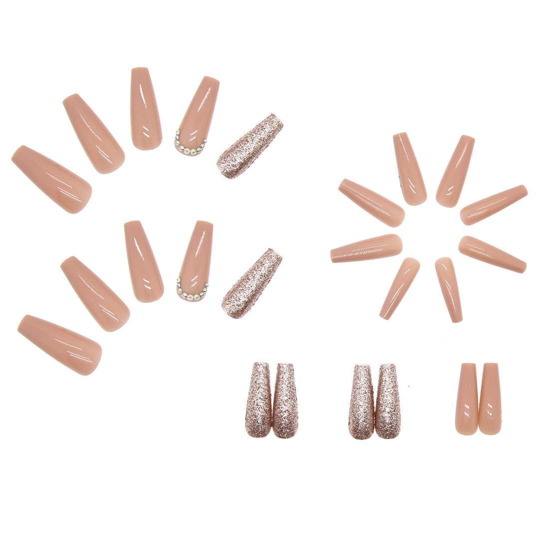 Glamorous artificial nail extensions with rhinestone and glitter details Kalsten
