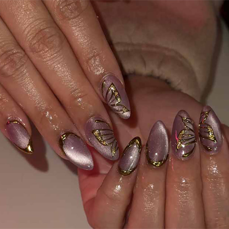 Artful Nail Extensions with Golden Accents Kalsten