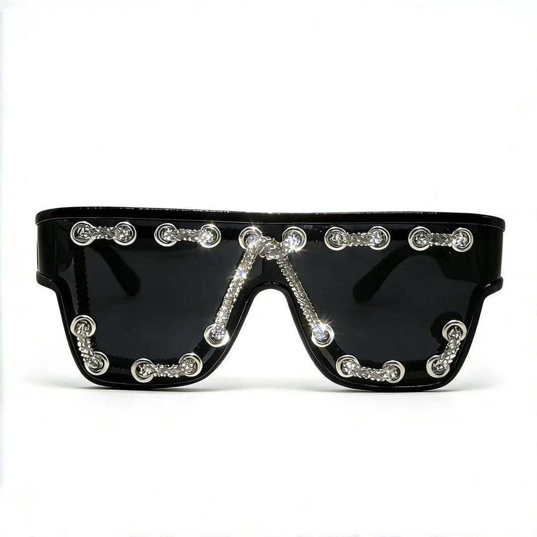 Ladies sunglasses with extravagant design and decorative chain embellishment Kalsten