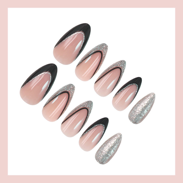 Artificial nail set with glamorous glitter accents and elegant black Kalsten
