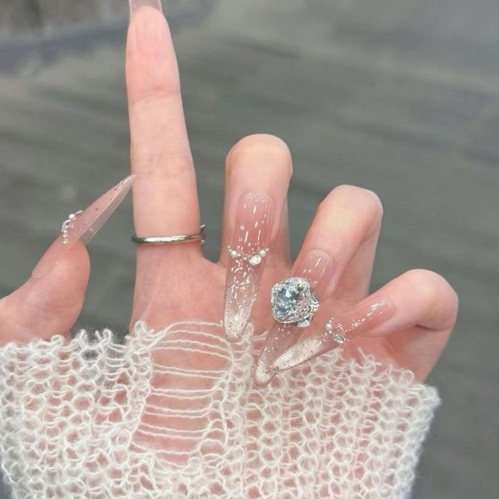 Artistic Stiletto Press-On Nail Art with Glimmering Accents Kalsten