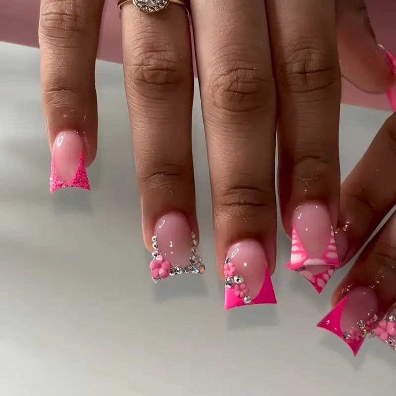 Glamorous Nail Art Set with Floral and Rhinestone Accents Kalsten