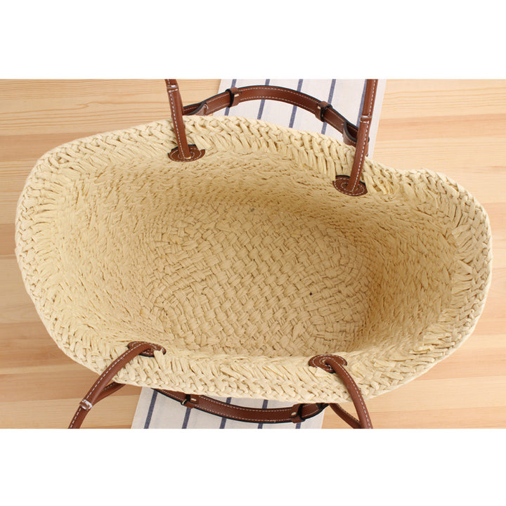 Beach bag made of handcrafted natural material with sturdy leather handle Kalsten
