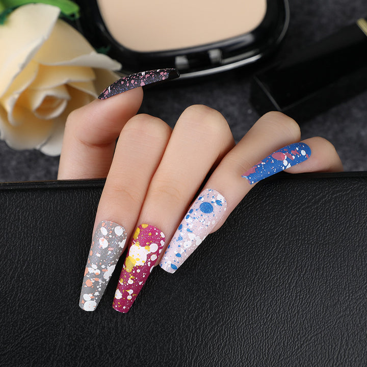 Artistic splatter design artificial nails Kalsten