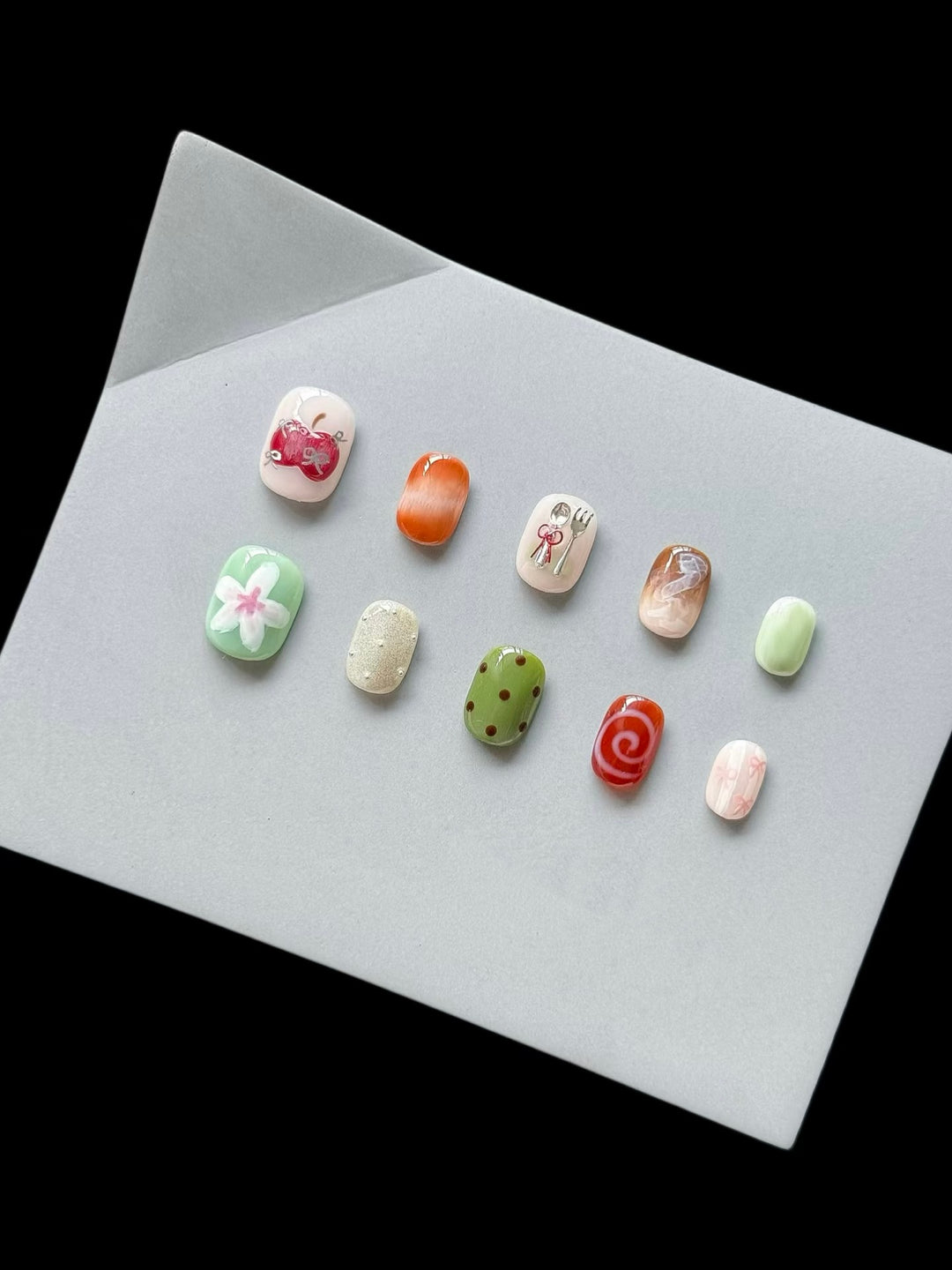 Artistic Press-On Nail Set with Unique Sketch Designs
