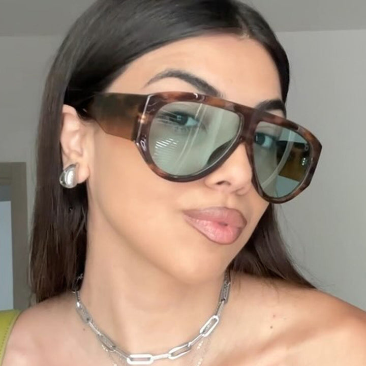 Ladies fashionable sunglasses in modern design with wide frame Kalsten