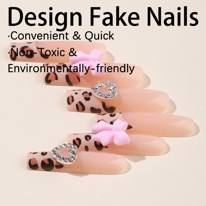 Creative nail set with leopard pattern and bow accents Kalsten