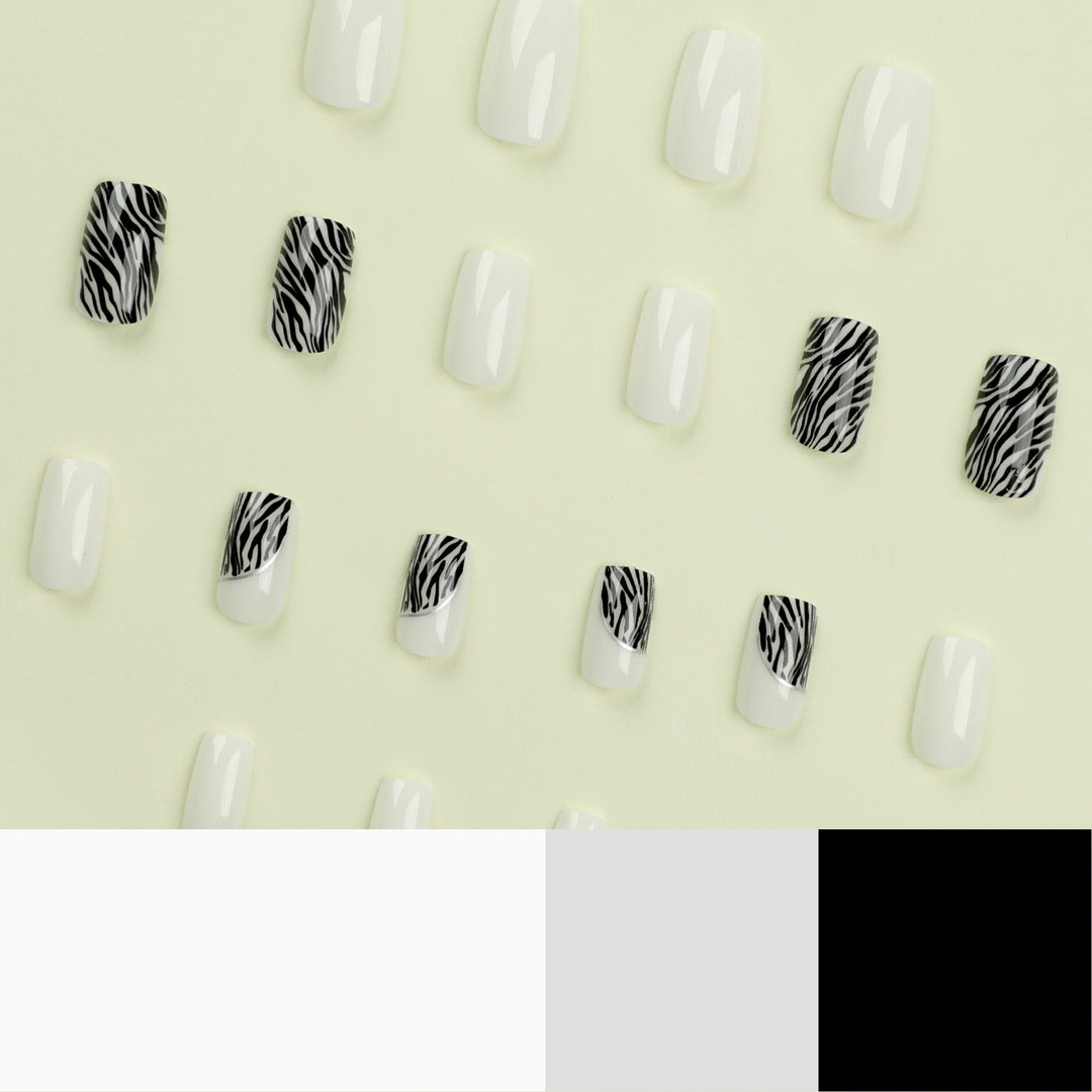 Artful nail extensions with stylish zebra pattern Kalsten