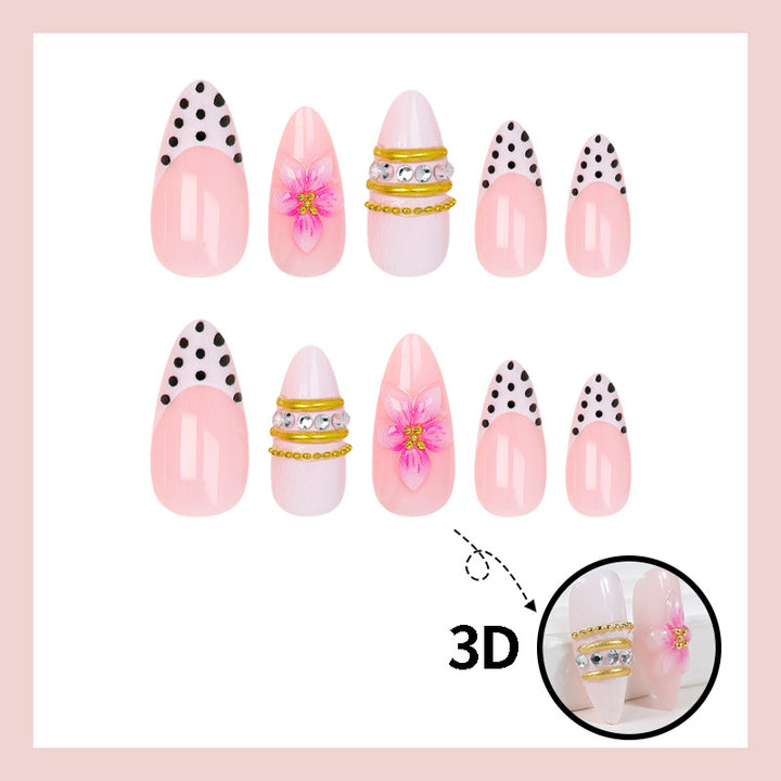 Acrylic nail set with romantic floral patterns and elegant glitter decorations Kalsten