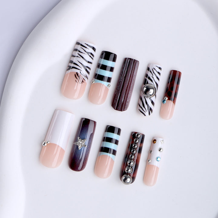 Artificial nails in modern striped design with 3D decoration Kalsten
