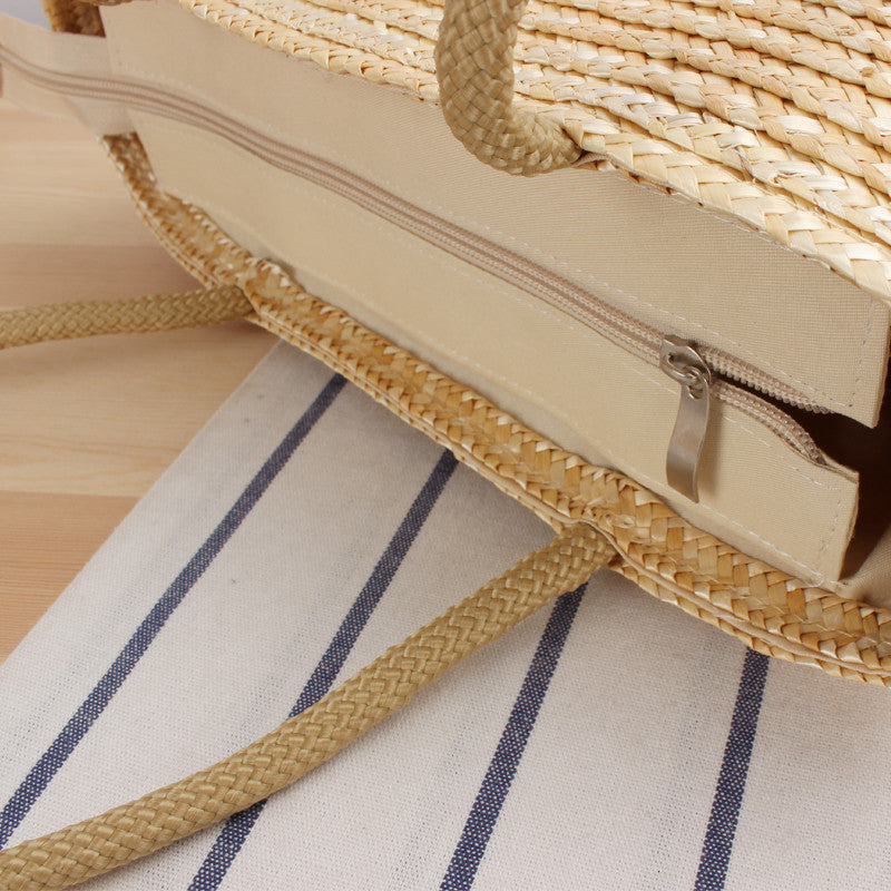 Shoulder bag made of braided natural material with long shoulder straps Kalsten