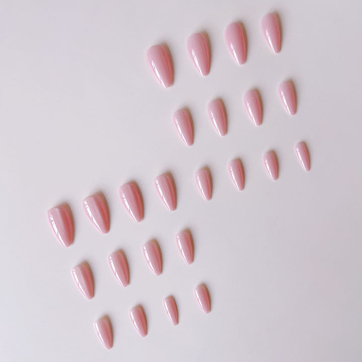 Acrylic nail set with glamorous high-gloss finish and delicate glitter accents Kalsten