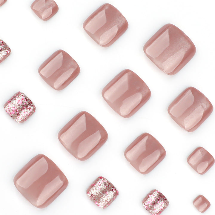 Artistic toenail design with glitter accents Kalsten