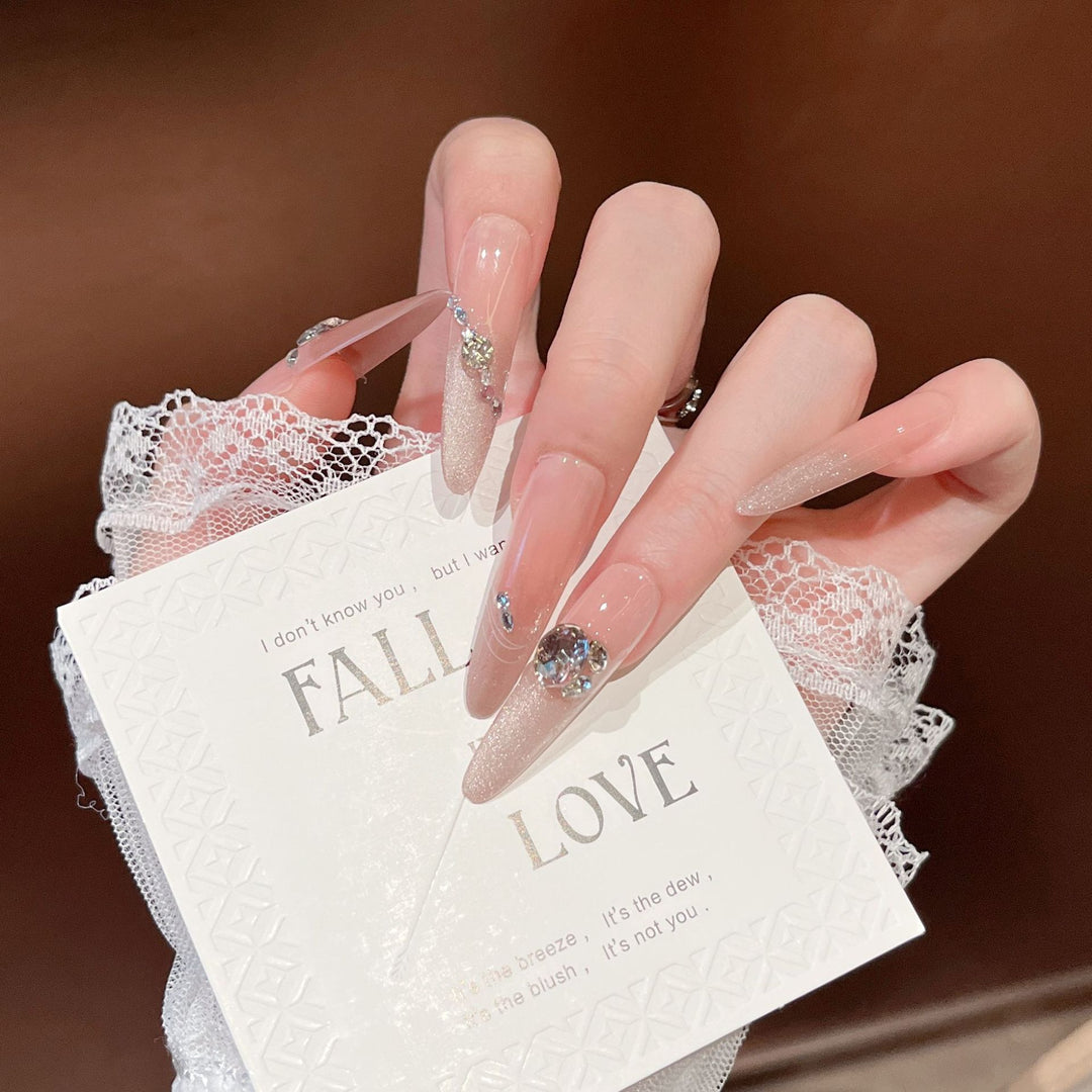 Artistic Stiletto Press-On Nail Art with Glimmering Accents Kalsten