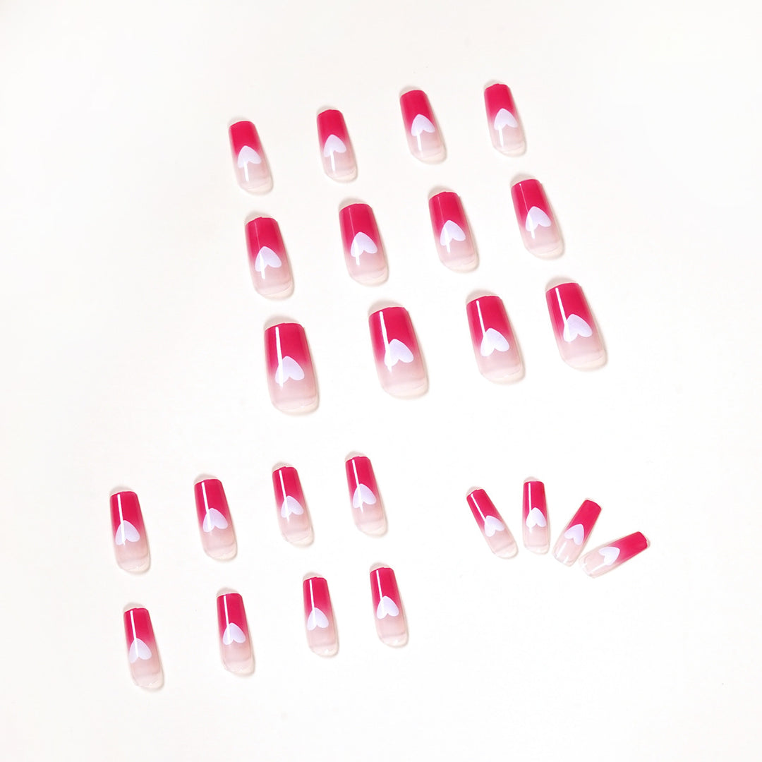Artful nail extensions in romantic heart design Kalsten