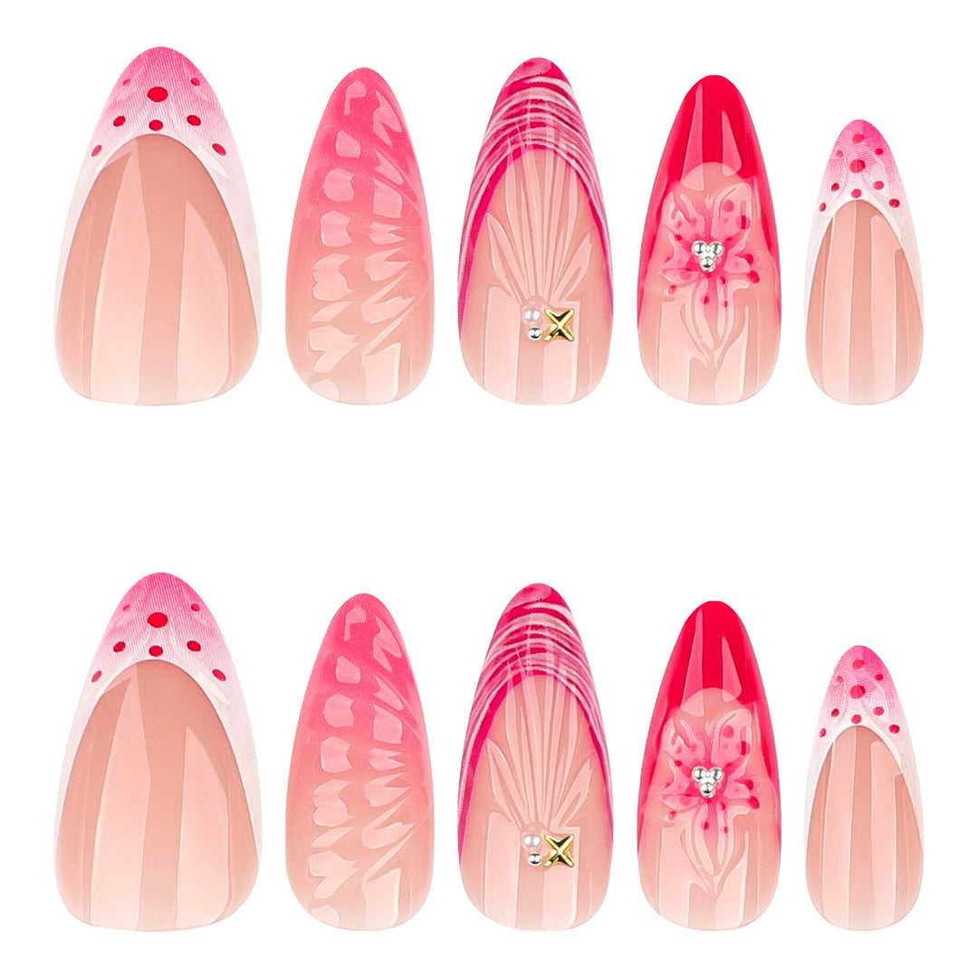 Artful stiletto nails with floral design and glitter accents Kalsten