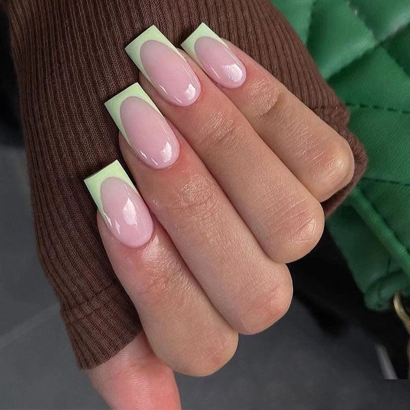 Artistic nail extensions with elegant French tip and modern accents Kalsten