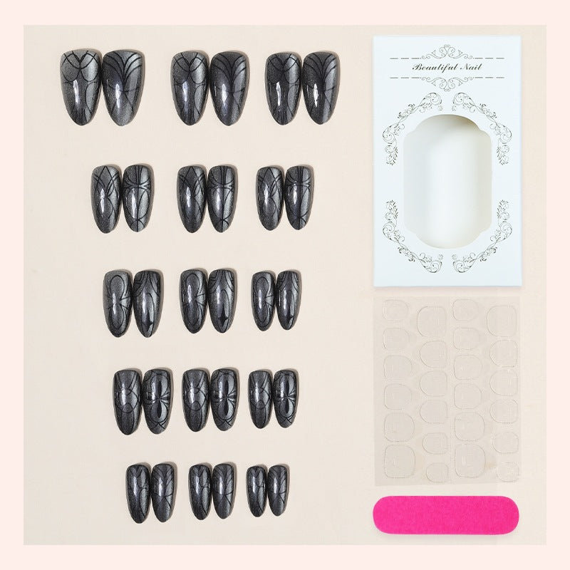Acrylic nail set with creepy spider design and glitter accents Kalsten