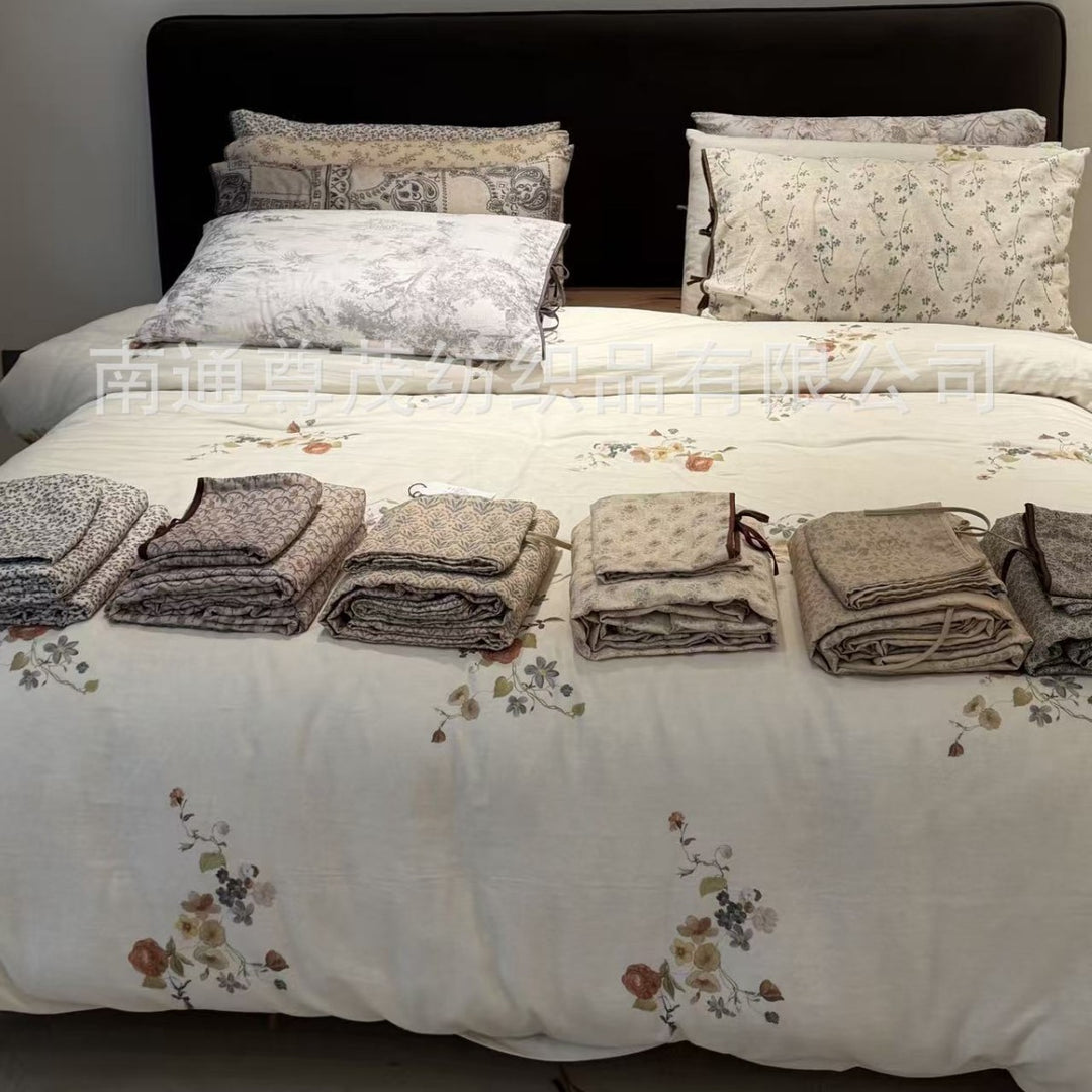 Finely woven cotton bedding set with delicate floral print and decorative ties