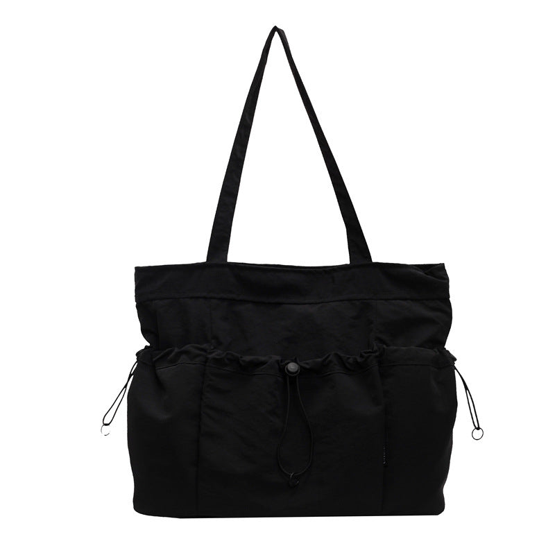 Practical everyday handbag with drawstring Kalsten