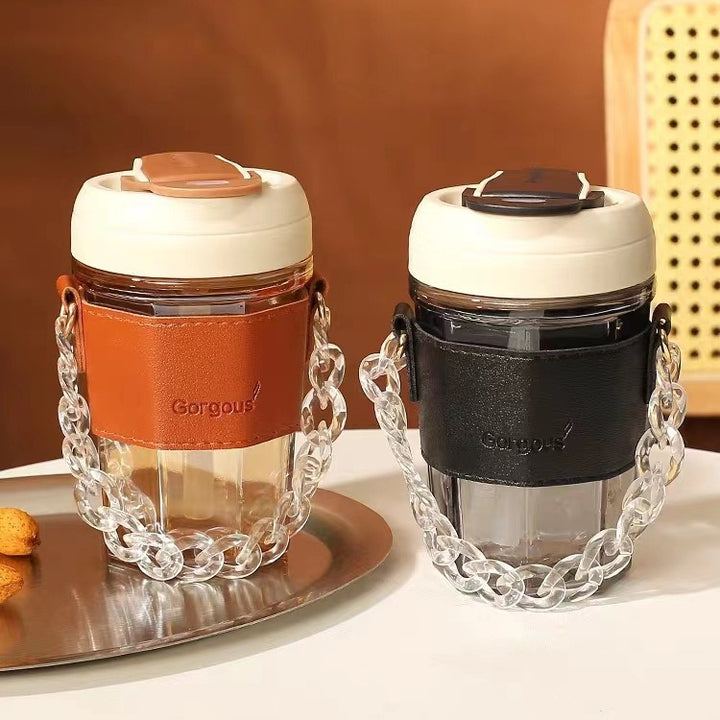 Women drinking cup with elegant leather handle and practical carrying chain Kalsten