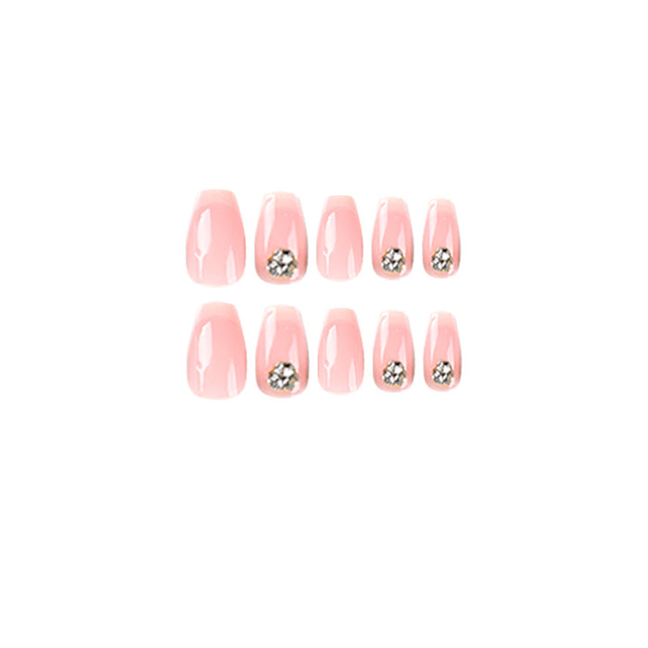 Artful nail extensions with elegant French tip and rhinestone embellishments Kalsten