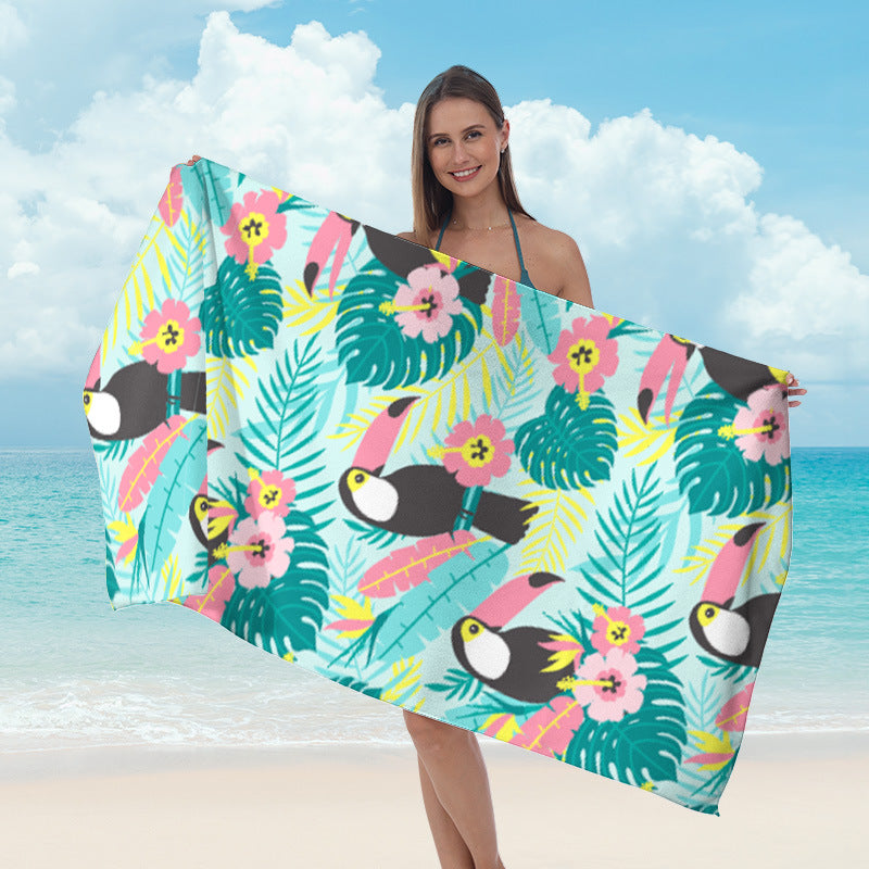 Beach towel with tropical leaf design Kalsten