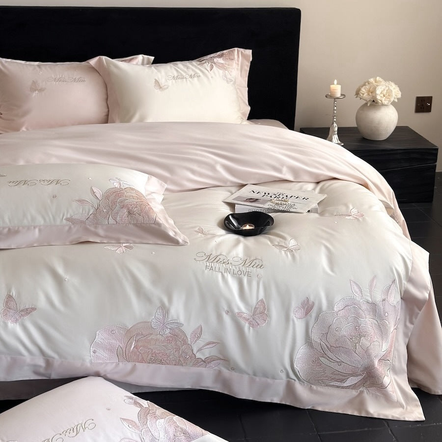 Luxurious satin bedding set with delicate rose and butterfly embroideries