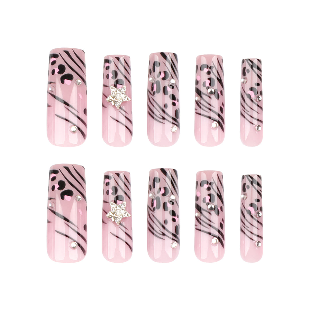 Artful Nail Art with Zebra Pattern and Glitter Accents Kalsten