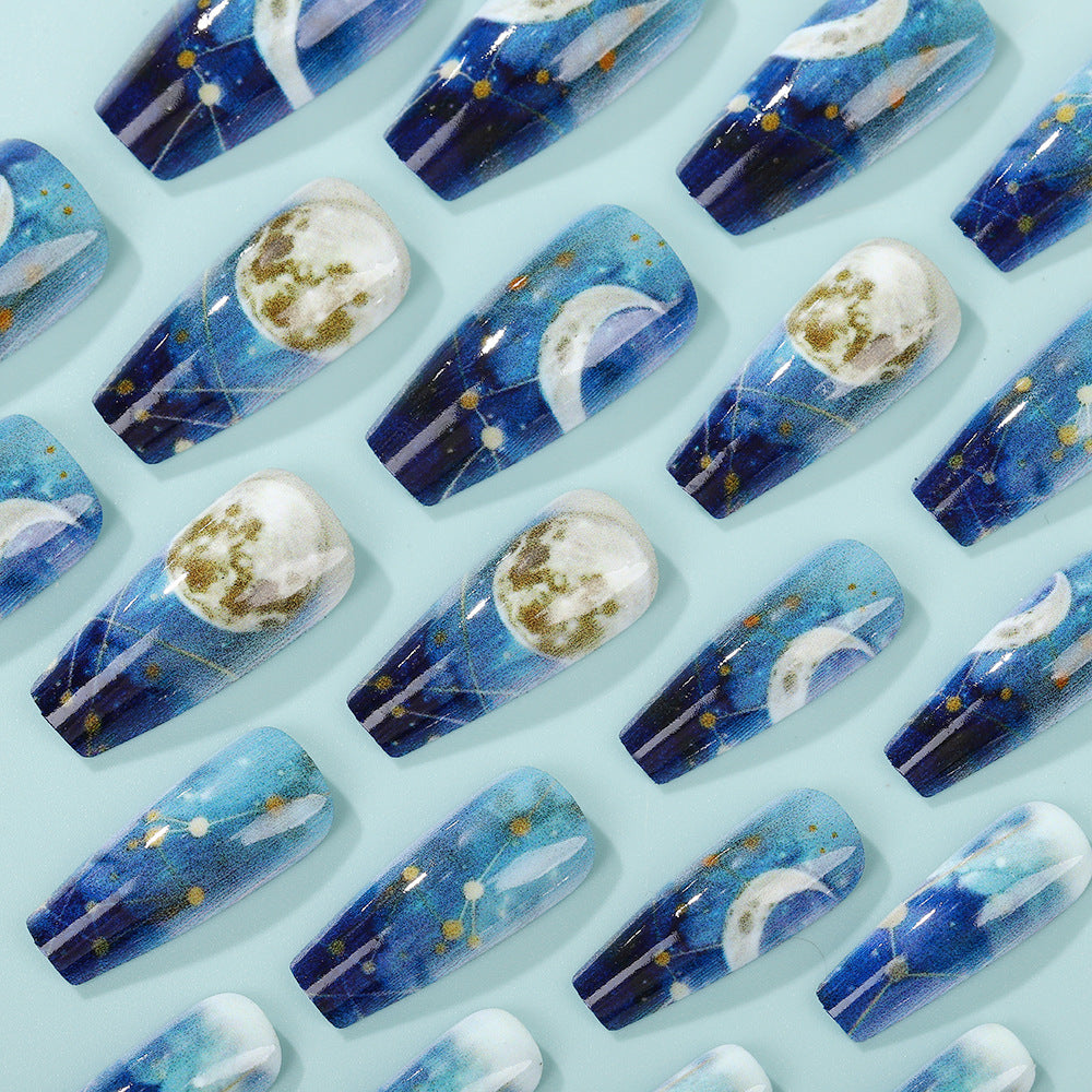 Dreamy artificial nails with moon and star design Kalsten
