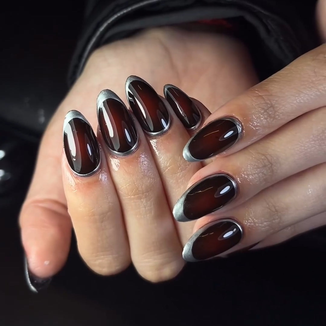 Stylish stiletto nails with elegant shine Kalsten
