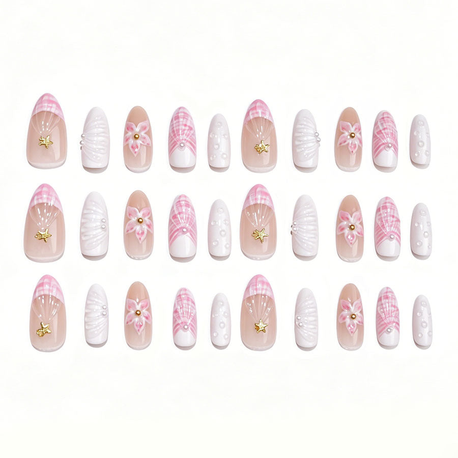 Art nail set with elegant floral decorations and glitter accents Kalsten