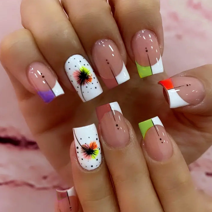 Artful nail art with gradient and floral accents Kalsten