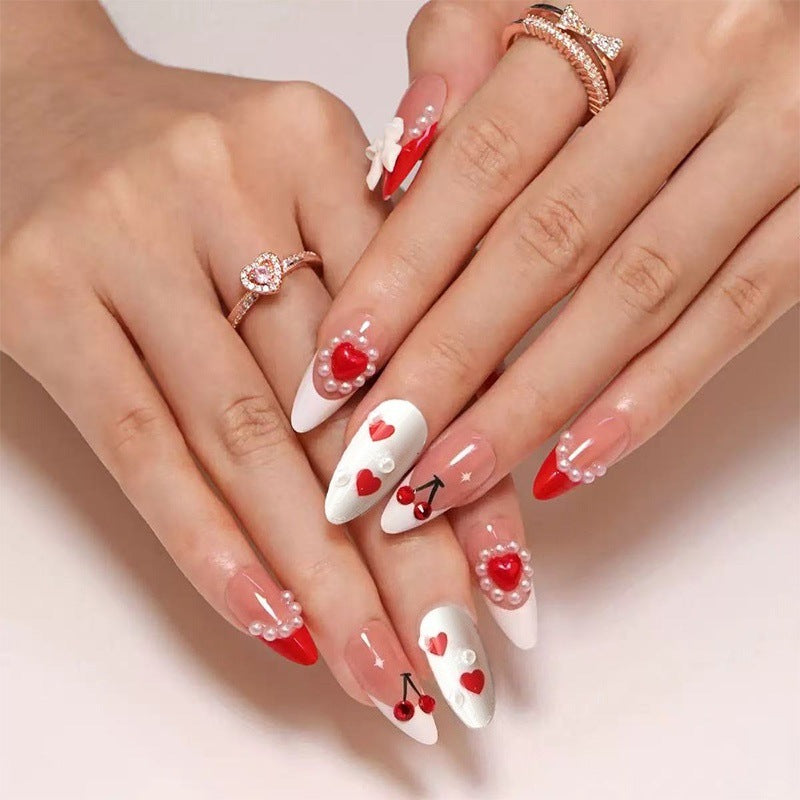 Creative nail art with heart and cherry motifs Kalsten