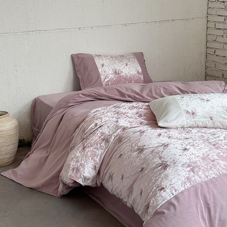 Luxurious velvet bedding set with crushed look and floral relief pattern