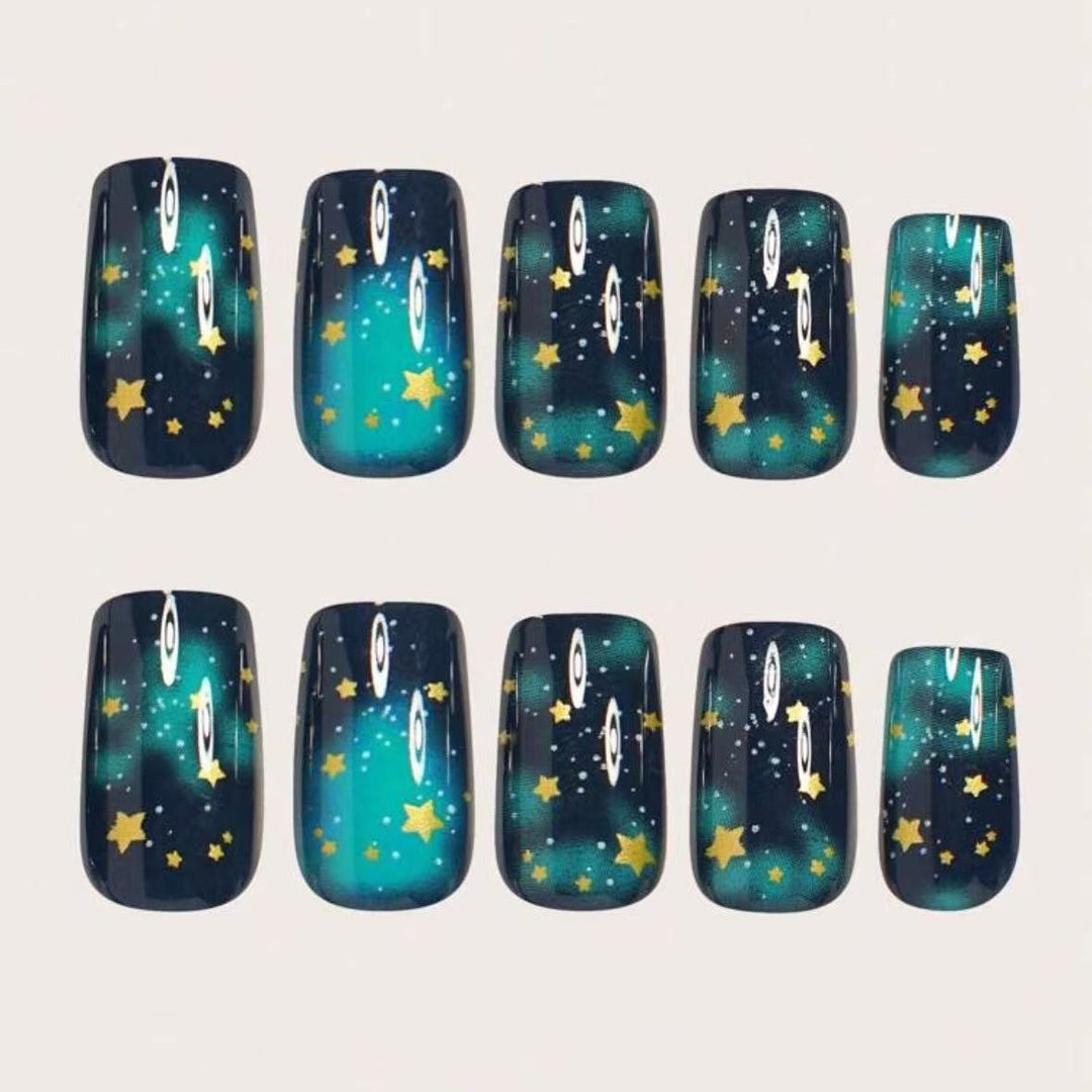 Glitter nail polish with star accents Kalsten