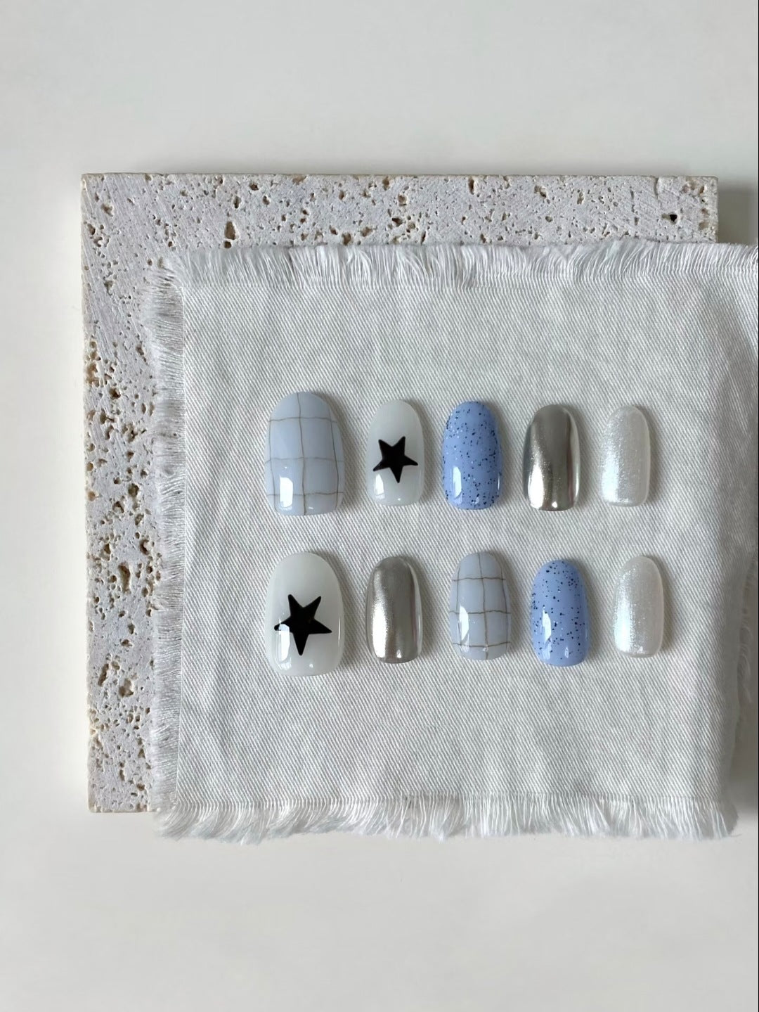 Artistic Press-On Nail Set with Geometric and Star Patterns
