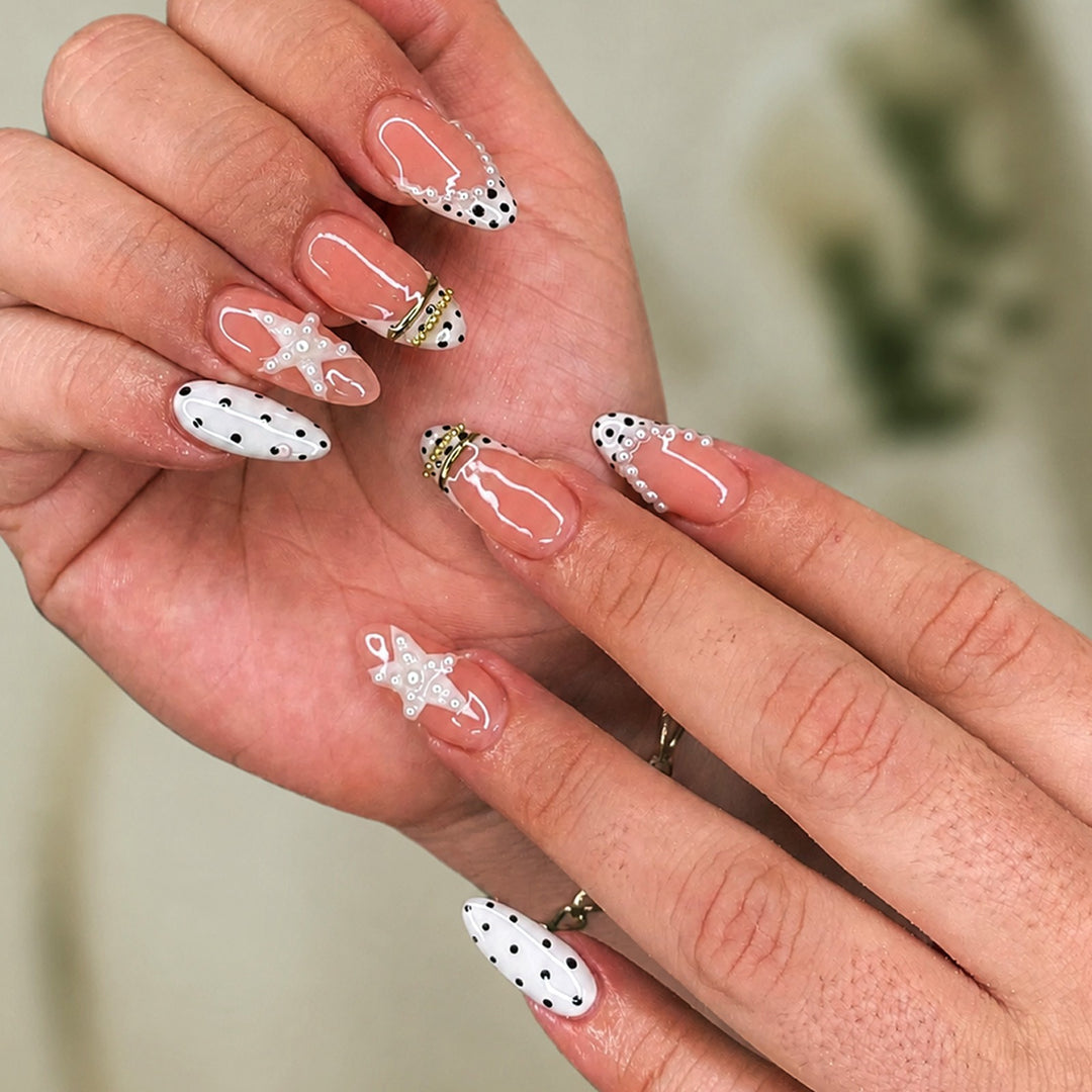 Nail set with elegant pearl and dot accents Kalsten