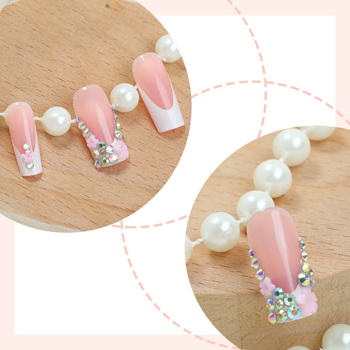 Nail set with elegant flower and glitter decorations Kalsten