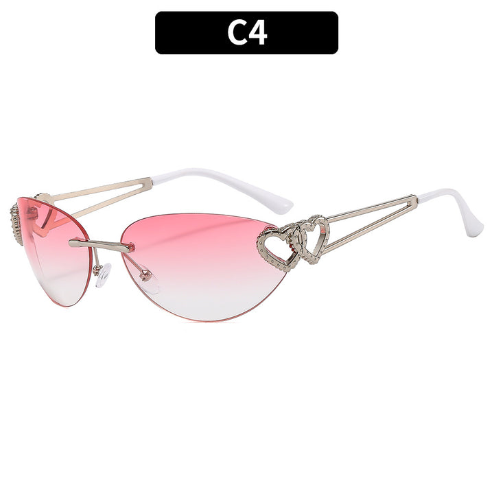 Fashion-Forward Cat-Eye Sunglasses with Heart Accents
