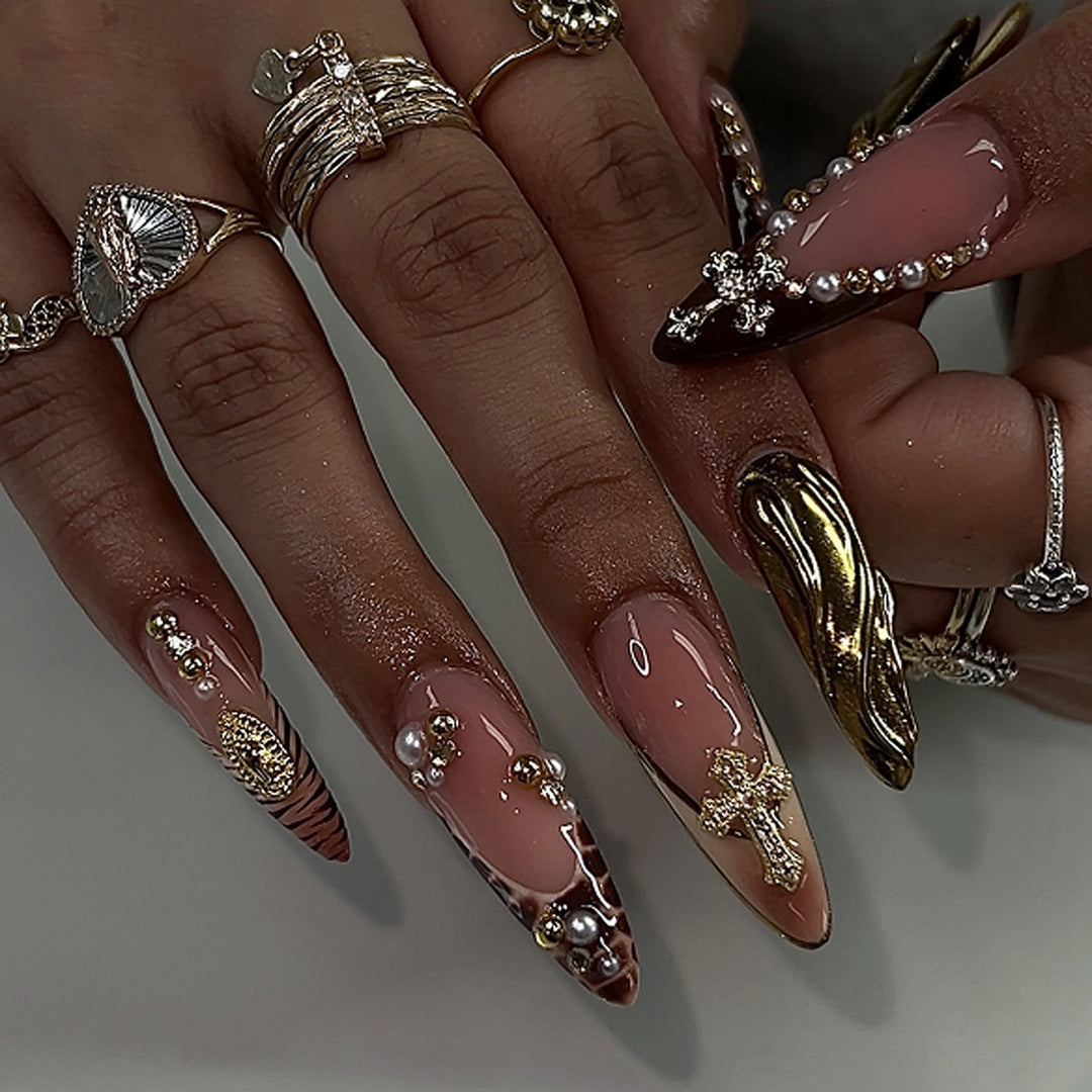 Artful acrylic nails with glitter and rhinestone decorations Kalsten