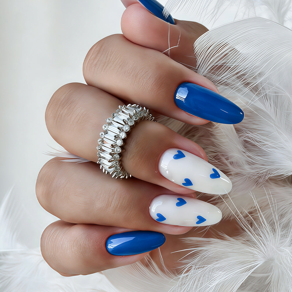 Stylish Long Stiletto Nail Art Tips with Heart Accents Kalsten