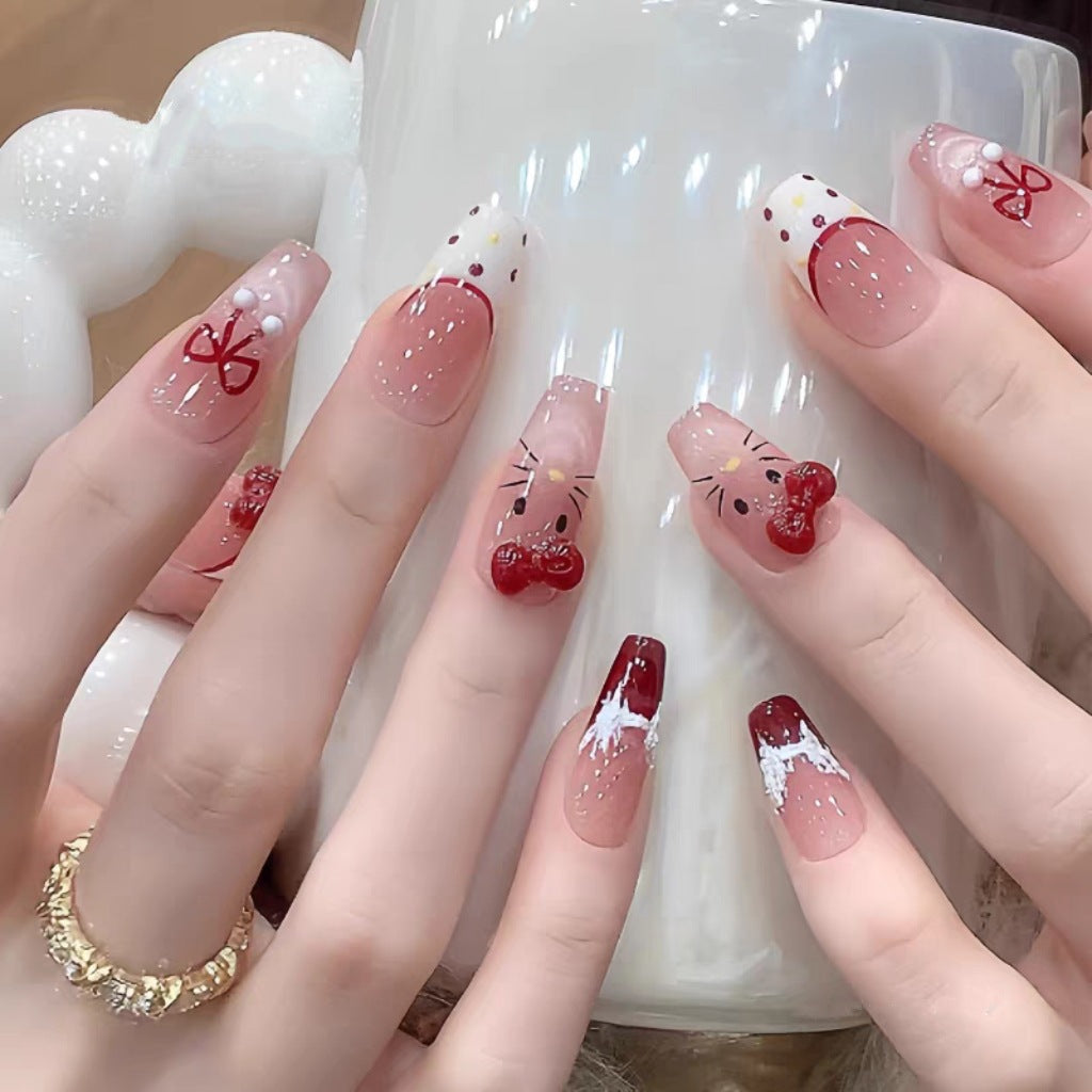 Glamorous artificial nails with playful 3D designs Kalsten