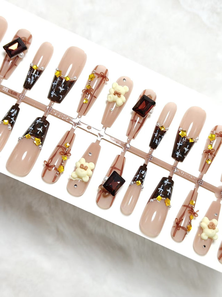 Artificial nails with playful animal designs and glitter effects Kalsten